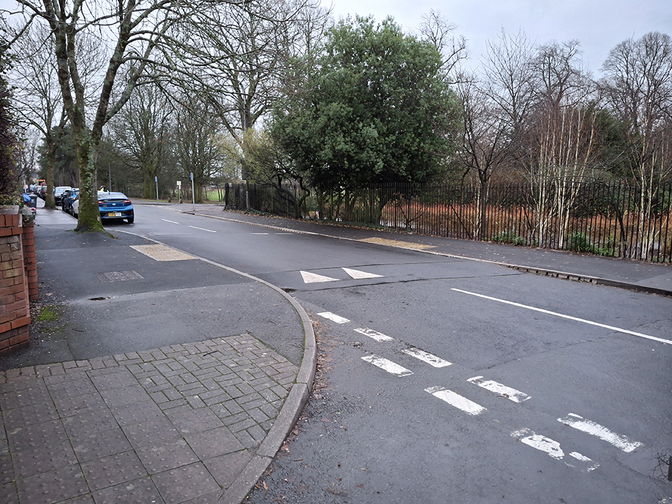 A photograph showing the new tabled uncontrolled crossing point on Ty Draw Road near the junction with Clos Derwen.